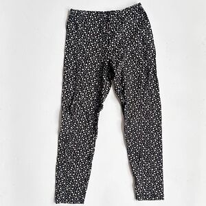Uniqlo Kids Black Star Print Leggings – Size 9–10